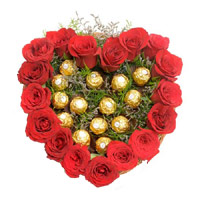 Same Day New Year Gifts in Hyderabad consisting Heart Of 16 Pcs Ferrero Roacher N 18 Red Roses Flowers in Vizag