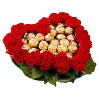 Diwali Gifts to Hyderabad with 24 Red Carnation 24 Ferrero Rocher Heart Arrangement