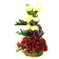 Get Diwali Flowers to Hyderabad. Red Rose Yellow Carnation Basket 30 Flowers in Hyderabad Online