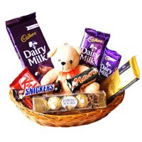 Send Christmas Gifts in Hyderabad comprising Exotic Chocolate Basket With 6 Inch Teddy