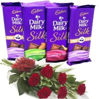 Deliver 4 Cadbury Dairy Milk Silk Chocolates With 6 Red Roses Christmas Gifts in Hyderabad