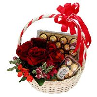 New Year Gift to Secunderabad summarise with 12 Red Roses, 40 Pcs Ferrero Rocher Basket