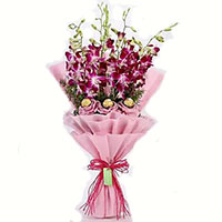 Send Diwali Gifts to Hyderabad. 10 Pcs Ferrero Rocher Chocolates in Hyderabad with 10 Red White Roses Bouquet Hyderabad