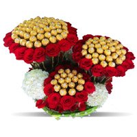 Send Online Diwali Gifts to Hyderabad including 96 Pcs Ferrero Rocher 200 Red White Roses Bouquet Hyderabad