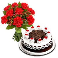 Deliver 12 Red Carnation 1/2 Kg Black Forest Cake to Hyderabad