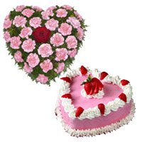 Get 36 Pink Carnation Christmas Flowers in Heart Shape and 1 Kg Heart Strawberry Cake to Hyderabad