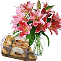 Send 15 Pink Lily Vase, 16 Pcs Ferrero Rocher. Diwali Flowers to Secunderabad