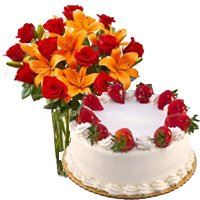 Online Delivery of Friendship Day Cakes to Hyderabad. 8 Orange Lily 12 Roses Vase 1 Kg Strawberry Cake to Hyderabad from 5 Star Bakery