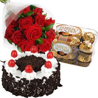 This Christmas, Deliver 12 Red Roses with 1 Kg Cake and 16 pcs Ferrero Rocher Chocolates to Hyderabad