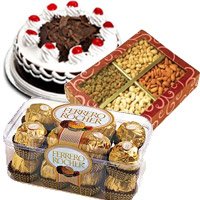 1/2 Kg Black Forest Cake with 1/2 Kg Dry Fruits and 16 pcs Ferrero Rochers Chocolates to Hyderabad. New Year Gifts to Vijayawada