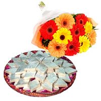Same Day New Year Gifts to Hyderabad comprising 12 Mix Gerbera with 1 Kg Kaju Barfi