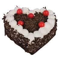 New Year Cakes Delivery in Rajahmundary delivers 1 Kg Eggless Heart Shape Black Forest Cake