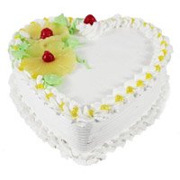 Send Rakhi and Cake to Hyderabad with 1 Kg best Eggless Heart Shape Pineapple Cake in Hyderabad