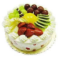 Send Cakes to Hyderabad. 1 Kg Eggless Fruit Cake From 5 Star Hotel on Rakhi