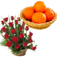 Send Diwali Gifts to Hyderabad containing 20 Fresh Red Roses Basket with 12 pcs Orange