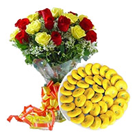 Same Day New Year Sweets to Vijayawada containing 1 kg Mava Peda with 12 Mix Roses Bouquet to Hyderabad