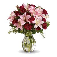 Best Flowers to Hyderabad on New Year send to 3 Pink Lily 12 Red Roses in Vase Hyderabad