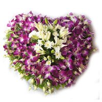 Friendship Day Flowers to Hyderabad with 3 White Lily 15 Orchids Heart Arrangement