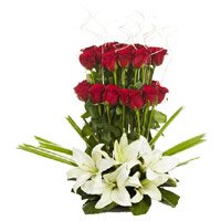 Flowers to Hyderabad. 3 White Lily 30 Red Rose Arrangement