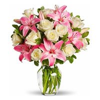 Place Order for Rakhi with Flowers. Pink Lily White Rose in Vase 15 Flowers to Hyderabad