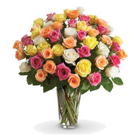 New Year Flower Delivery in Vizag containing Mixed Roses Vase 36 Flowers in Hyderabad