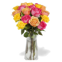 Christmas Flowers in Hyderabad Online to Deliver Pink, Peach, Yellow Roses Vase 12 Flowers