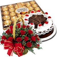 New Year Gifts Delivery in Hyderabad including 24 Red Roses Basket with 0.5 Kg Black Forest Cake to Hyderabad Online with 24 pcs Ferrero Rocher.
