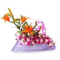 Send 9 Orchids 3 Lily Arrangement. Online Rakhi Flower Delivery in Hyderabad