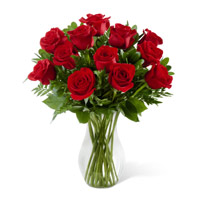 Red Roses in Vase 12 Flowers to Hyderabad. Send Flowers Basket to Hyderabad