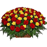 Place Online Order to Send New Year Flowers to Hyderabad containing Red Yellow Roses Basket 100 Flowers