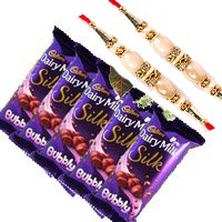 Order 5 Cadbury Silk Bubbly Chocolate With 3 White Roses with rakhi Delivery in Hyderabad