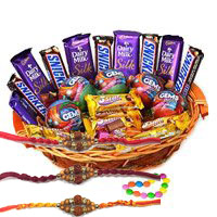 Online Rakhi Gift Delivery to Hyderabad that includes Cadbury Snicker Chocolate Basket on Rakhi