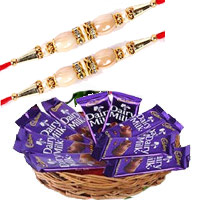 Place Order for Rakhi and Dairy Milk Basket 12 Chocolates With 12 Pink Roses in Hyderabad