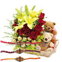 Rakhi Gifts Online to Hyderabad. 2 Lily 12 Roses 16 Ferrero Rocher Twin Small Teddy Basket