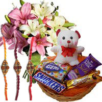 Deliver 6 Pink White Lily with 6 Inches Teddy and Chocolate Basket Gifts in Hyderabad on Rakhi