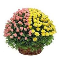 Online Christmas Flowers to Hyderabad comprising 100 Pink and Yellow Roses Basket