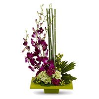 Send Valentine's Day Flowers to Hyderabad having 5 Orchids 10 Carnation Flower Arrangement