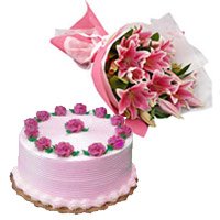 Send New Year Gifts to Vishakhapatnam having 1/2 Kg Strawberry Cake with 5 Pink Lily Bouquet Hyderabad