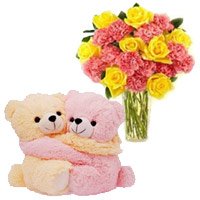 Valentine's Day Flowers to Hyderabad having 24 Pink Carnation Yellow Rose Vase With Hugging Teddy Bear
