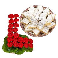 Valentine's Day Flowers in Hyderabad comprising 24 Red Carnation Basket, 1/2 Kg Kaju Burfi