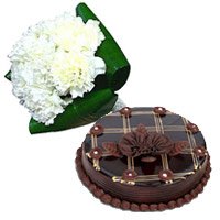 Order Diwali Gifts Online 12 White Carnation, 1 Kg Chocolate Cake to Hyderabad