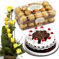 Same Day New Year Gifts to Vijayawad containing 15 Yellow Rose Basket, 16 Pcs Ferrero Rocher with 1/2 Kg Black Forest Cake in Hyderabad