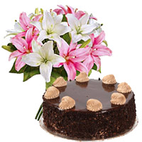 Deliver New Year Gifts inHyderabad including 6 Pink White Lily 1 Kg Chocolate Cake From 5 Star Hotel