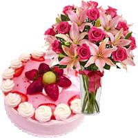Send Flowers and Cake to Vijayawada consisting 4 Pink Lily 15 Rose Vase Flowers Hyderabad and 1 Kg Strawberry Cake From 5 Star Hotel