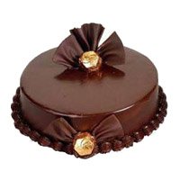 Midnight New Year Cakes Delivery in Vijayawada delivers 2 Kg Chocolate Truffle Cake to Hyderabad