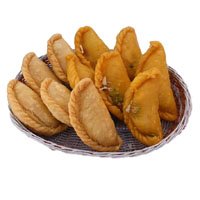 Best Christmas Gifts to Hyderabad comprising 500 gm Gujiya