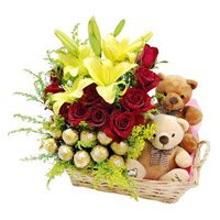 Same Day Valentine's Day Flowers to Hyderabad that contains 2 Lily 12 Roses 16 Ferrero Rocher Twin Small Teddy Basket