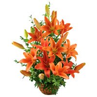 Midnight Flower Delivery in Vishakhapatnam that contains Orange Lily Arrangement 12 Flower Stems