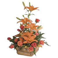 Valentine's Day Flowers Delivery in Hyderabad delivers 6 Orange Lily 12 Orange Roses Flower Arrangement