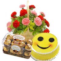 Deliver New Year Gifts in Secunderabad comprising 15 Red Pink Carnation Basket Hyderabad, 16 pcs Ferrero Rocher and 1 Kg Smiley Cake to Hyderabad